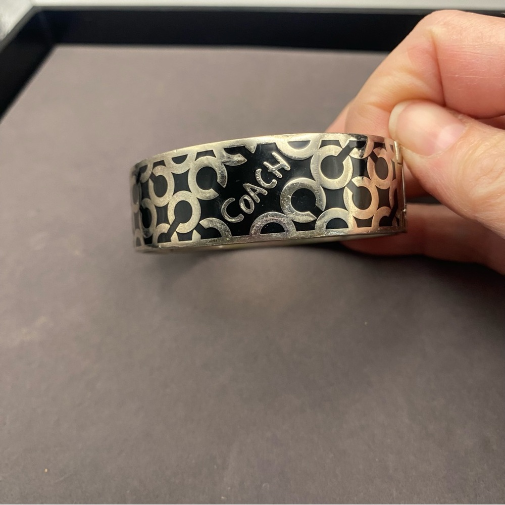 Coach Silver-Tone Black Logo Hinged Bangle Bracelet